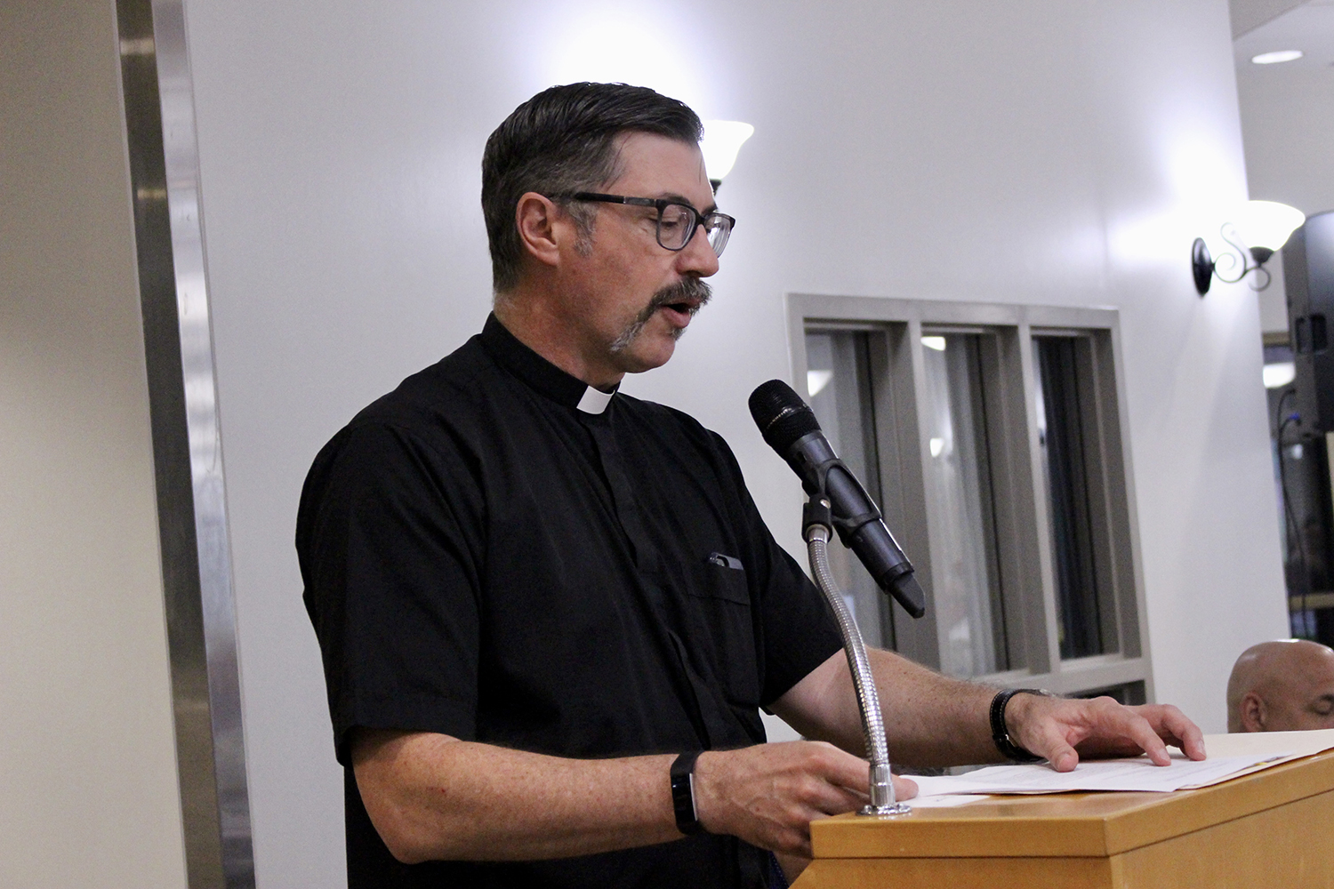 Rev. Eric Waters (St. Johns Lutheran Church) prays the invocation