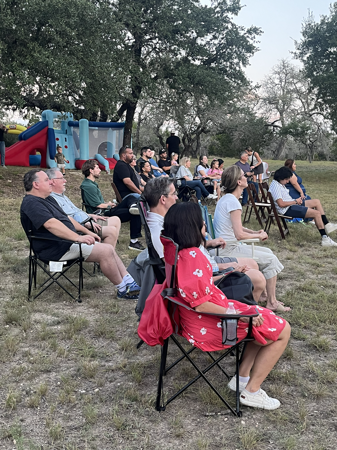 Everyone takes in the large screen presentation